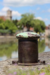 Old bollard in the port