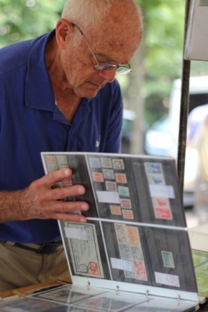 Dad checks out the old stamps